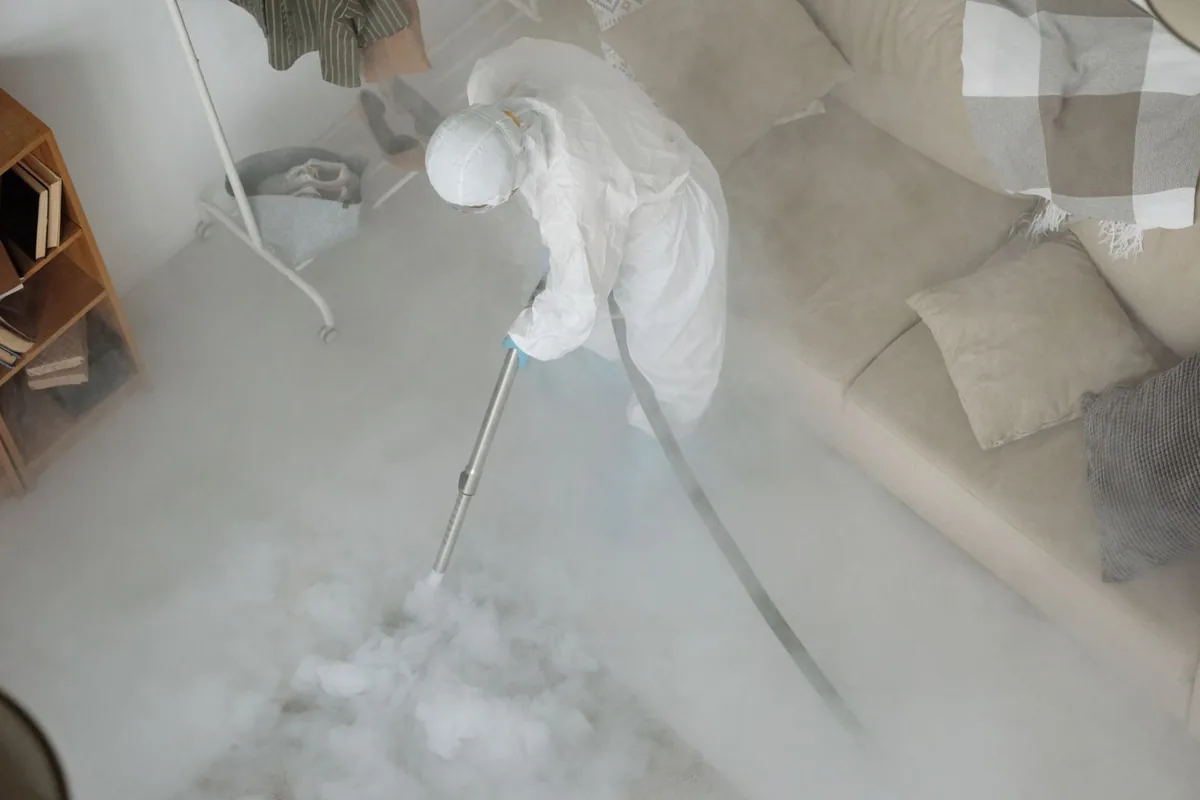 Biohazard cleanup technician in protective equipment, Tigerville, SC